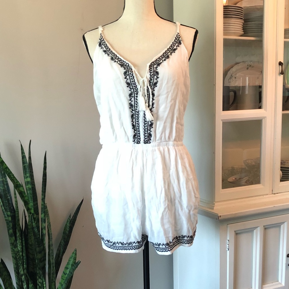White with black embroidery romper